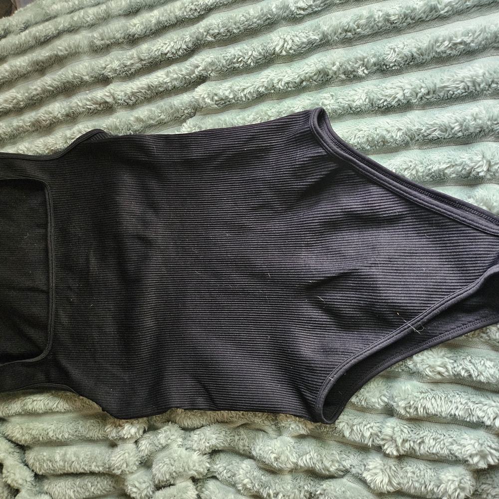 Sleek Black Bodysuit Top with Classic Scoop Neckline